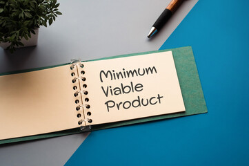 There is notebook with the word Minimum Viable Product.It is as an eye-catching image.