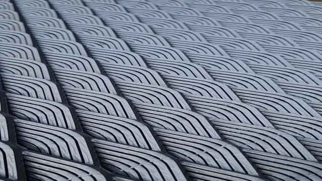 close up Steel grating zigzag pattern iron grating mesh background image, wave pattern steel mesh.