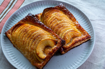 Tasty sweet French dessert, baked apple cake, Normandy region, France, close up