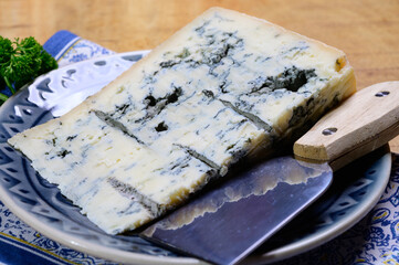 Italian food, buttery or firm blue cheese made from cow milk in Gorgonzola, Milan, Italy