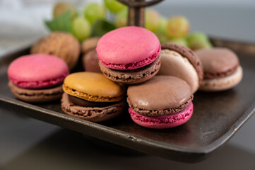 Macarons or French macaroon  sweet meringue-based confection made with egg white, icing sugar, granulated sugar, almond meal, and food colouring