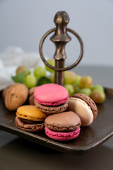 Macarons or French macaroon  sweet meringue-based confection made with egg white, icing sugar, granulated sugar, almond meal, and food colouring