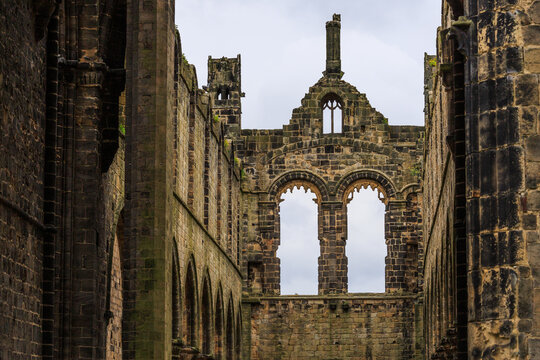 England, West Yorkshire, Leeds, North Bank of river Aire. Kirkstall Abbey, 12th century Cistercian Monastery ruins.