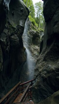 Beautiful Sigmund Thun Klamm gorge. Waterfall between rocks. Austria Alps