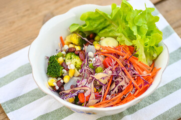 Thai food vegetable salads on salads bowl with fresh vegetable fruit nuts and grains for healthy food mixed vegetable salad vegetarian green and colorful food for breakfast