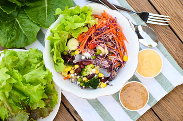 Thai food vegetable salads on salads bowl with salad dressing fresh vegetable fruit nuts and grains for healthy food mixed vegetable salad vegetarian green and colorful food for breakfast