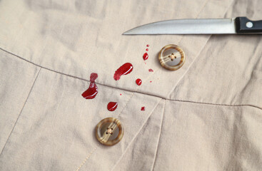 Dirty blood stain splash on cloth fron using sharp knife in cooking. dirty stain for cleaning...