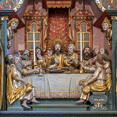 Jesus givs the bread to Judas Iscariot, a medieval reredos