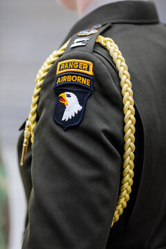Servicemen of the 10th Mountain Division and of the 101st Airborne Division (Air Assault), both of the US Army, attend the transfer of authority ceremony between them.