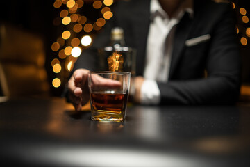 Barman pouring whiskey whiskey glass beautiful night