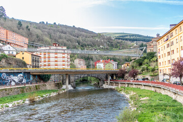 Narcea river as it passes through the center of the city of Cangas del Narcea in Asturias, Spain