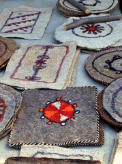 Handmade rugs made from camel wool.  Turkmenistan. Ashkhabad market. - 595476391