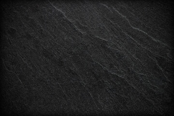 Dark grey black slate background or texture.