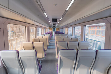 Naklejka na ściany i meble Interior of the empty passenger carriage of the train.