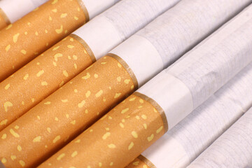 Background of cigarettes on a gray background, the concept of cigarette products, the harm of smoking