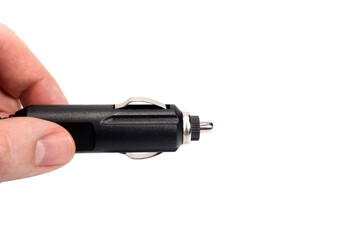 cigarette lighter plug in hand isolated on white background