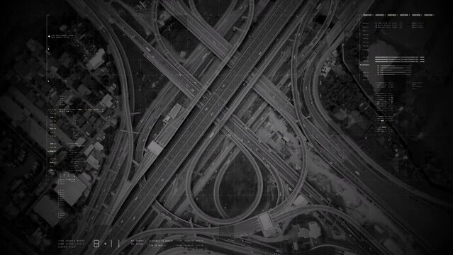Futuristic HUD satellite view of traffic surveillance on a busy expressway junctions tracking and monitoring highway traffic for possible target vehicle