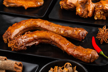 Delicious spiced duck neck on a plate