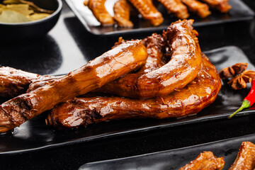 Delicious spiced duck neck on a plate