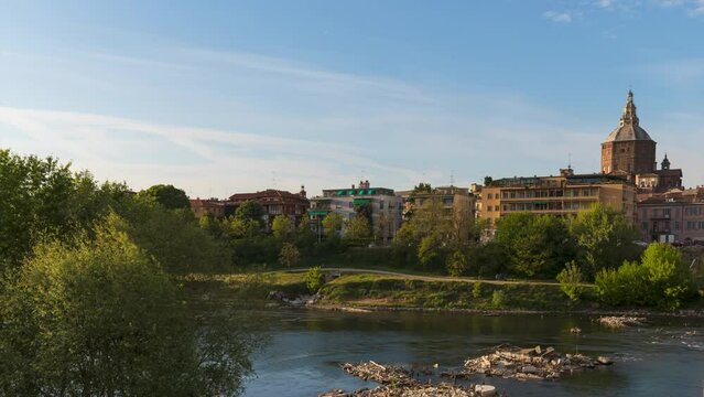 Ponte Coperto (covered bridge) and Duomo di Pavia (Pavia Cathedral) in Pavia at sunset,Lombardy, italy. motion Timelapse at 30 fps