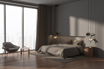 Hotel bedroom interior with bed and armchair near panoramic window. Mockup wall