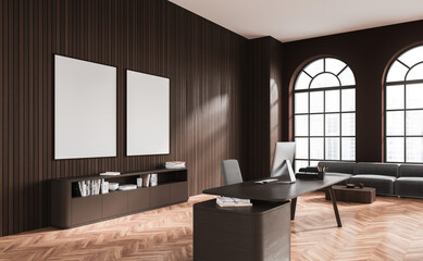 Wooden and brown CEO office with posters