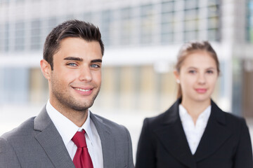 Smiling business people