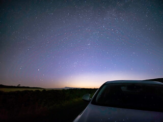 car in the night with Milky Way