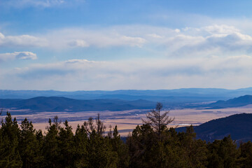 Aerial view of scenic mountains and valleys in spring from mountain peak