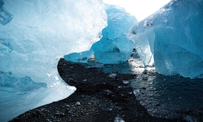 ice blocks on the diamond beach in iceland - obrazy, fototapety, plakaty