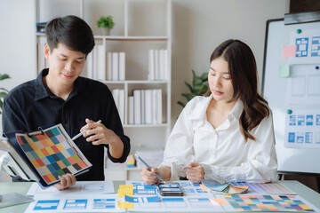 Fototapeta premium Creative team web designer planning application development for web mobile phone at modern workplace.