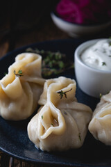 Manti with sour cream and thyme