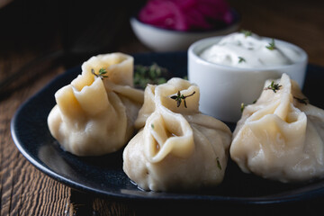 Manti with sour cream and thyme