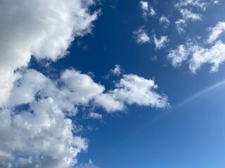White clouds on a blue sky.