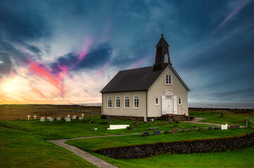 Fototapeta na wymiar Strandarkirkja is a Lutheran parish church in Selvogur, on the south coast of Iceland