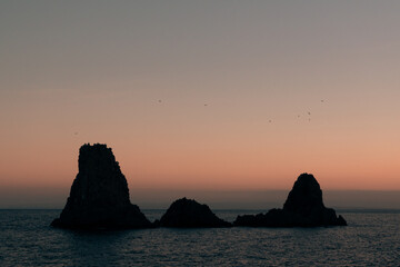 Cyclops Islands, Faraglioni of Aci Trezza. Small Sicilian archipelago. Large islands and rocks of...