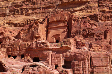 Street of facades in ancient Petra, archeological park in Jordan, Wadi Musa. Carving buldings in the mountains. 