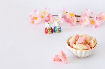 Fototapeta na wymiar Festival of Japanese girls. Pink, white rice cakes in the shape of diamond.