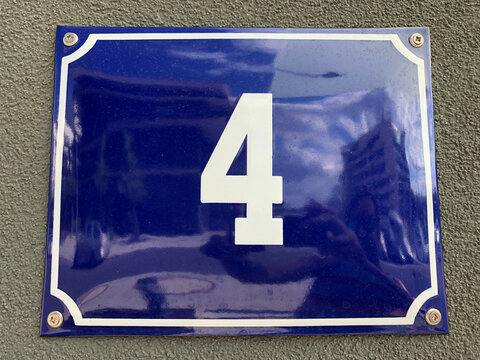 Beautiful blue metal sign that says number four - Powered by Adobe