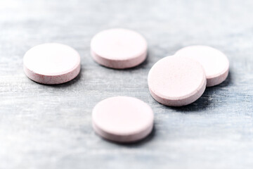 Collagen effervescent Tablets. Supplement to support collagen production. Bright wooden background. Close up. Copy space.	