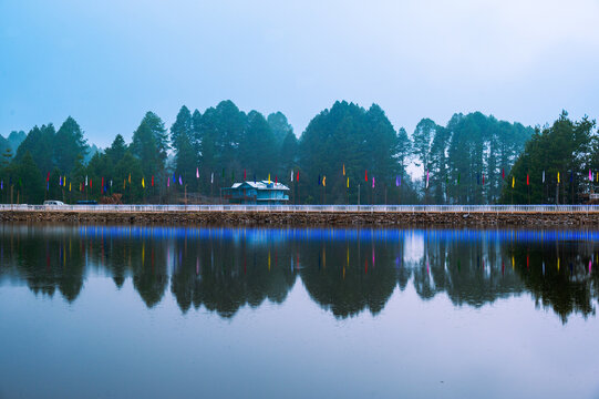 Reflection of trees in the lake. SEEH LAKE, Biirii, Ziro, Arunachal Pradesh, India. 'SWKHE LAKE" man-made marble located at Ziro, Arunachal Pradesh, Indi. A major tourist attraction.