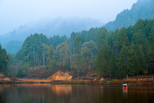 Reflection of trees in the lake. SEEH LAKE, Biirii, Ziro, Arunachal Pradesh, India. 'SWKHE LAKE" man-made marble located at Ziro, Arunachal Pradesh, Indi. A major tourist attraction.