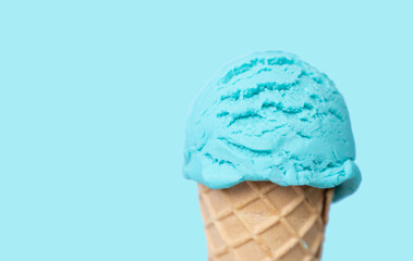 Blue ice cream scoop in cone - Powered by Adobe