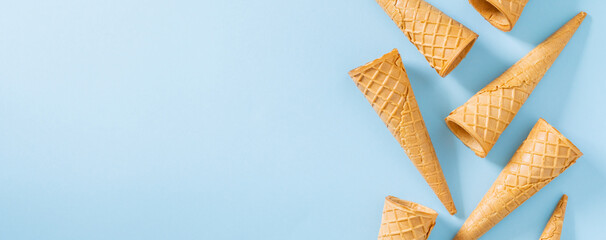 Ice cream cones on bright blue background