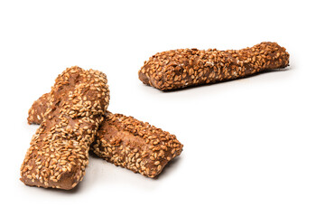 Loaf of bread with sunflower seeds isolated on a white background.