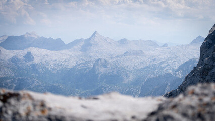 Alpine landscape with mountain ranges viewed from high mountain summit, Watzmann, Germany