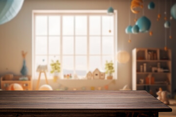Wooden table free space over blur background of childrens room with kid toys. Product display...