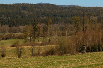 Hunting observation tower in a mountainous landscape 