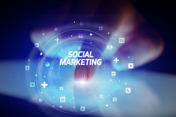 Finger touching tablet with social media icons concept