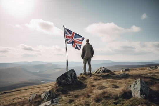 A man on top of a mountain holding a united kingdom flag,  generative AI